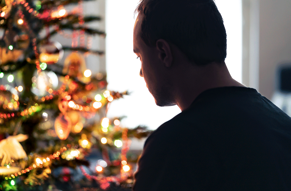 a man struggles to cope with depression during the holidays