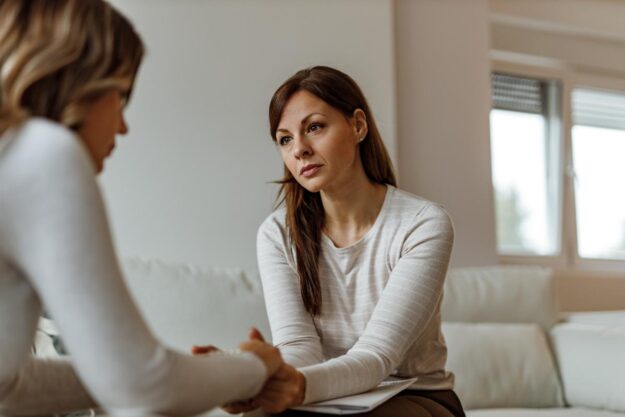 a woman enters a residential dual diagnosis treatment program