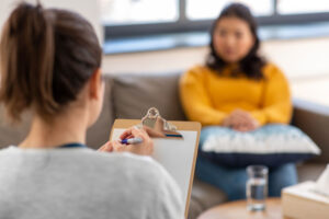 a woman participates in cognitive behavioral therapy